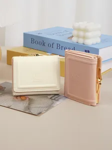 Compact pastel short wallets featuring cute rabbit embossing and vintage metal kiss-lock clasp