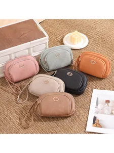 Set of six colorful faux leather double zipper clutches with wrist straps for women
