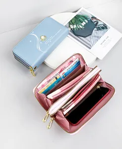 Detailed view of the multi-functional large capacity pink wallet with double zippers