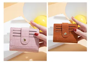Detailed view of pink and brown stone texture women's card wallets with snap closure