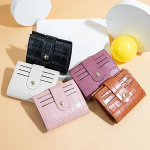 Women's crocodile pattern short wallet with snap closure and multi-card slots in multiple colors