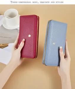 Detailed view of red and blue lychee texture long wallets for women with leaf logo