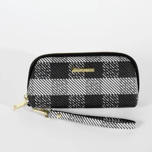Elegante borsa da polso da donna con motivo a scacchi bianchi e neri e hardware dorato