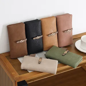 Collezione di portafogli lunghi testurizzati da donna con eleganti fibbie a foglia vari