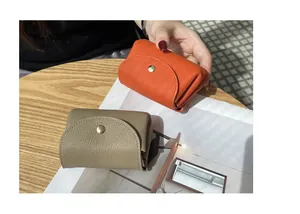Genuine pebbled leather mini coin purses in orange and khaki, Japanese style detail