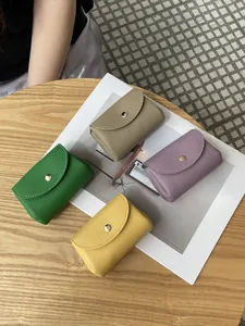 Minimalist genuine pebbled leather mini coin purses in four colors with snap button