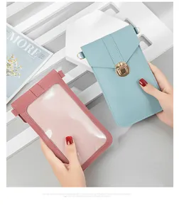 Close-up view of minimalist crossbody phone bags with touch screen window and buckle.