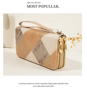 Elegante cartera retro de cuero patchwork con doble cremallera y correa para mujer.