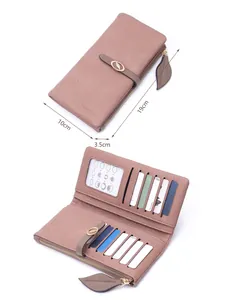 Elegante portafoglio lungo da donna rosa antico con fessure per carte e ciondolo a foglia