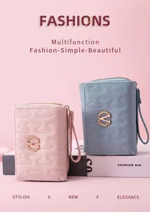 Detail view of stylish women's short wallets featuring wavy stitching and a wheat ear V-logo.