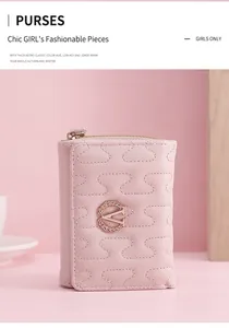 Detailed macro shot of a chic pink quilted women's short wallet with elegant gold V logo