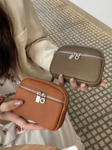 Mini double zipper coin purse for women in textured brown and olive green colors