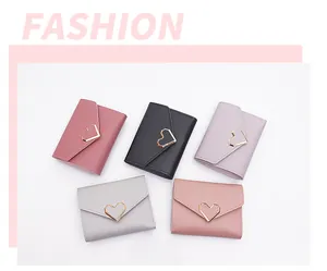 Collection of five stylish women's mini wallets with geometric heart buckles in various colors