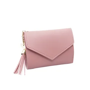Dusty pink small folding wallet for women with heart pendant and tassel decoration