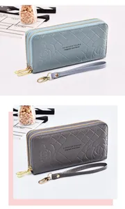 Detailed view of long double-zipper wallets in blue and grey with wrist straps