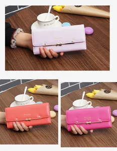 Elegant women's long wallet with bowknot detail and metallic accents in various colors