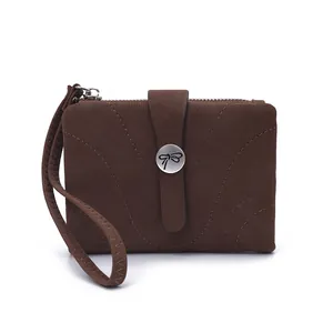 Compact brown faux leather wallet for women with butterfly clasp and wrist strap