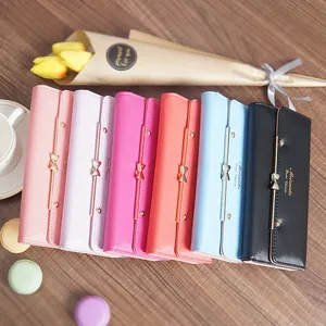 Fashionable long women's wallets in pastel colors with cute bow-knot and rivet design