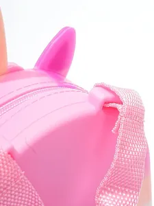 Detailed close-up of a pink unicorn silicone backpack for children with adjustable straps