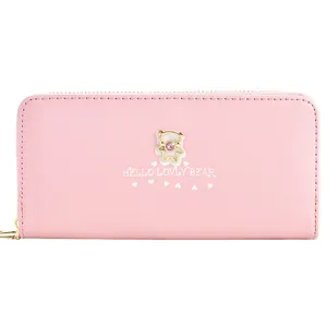 Simpatico portafoglio lungo rosa da donna con ciondolo a orsetto dorato e zip sicura