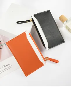 Detail view of color-block PU leather card holders with smooth zipper closure style.