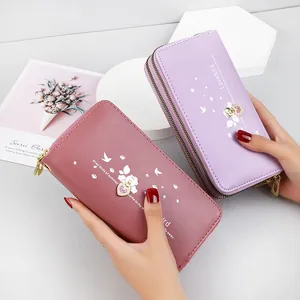 Elegant long wallets for women featuring heart print and double zipper design in purple