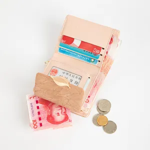 Vintage matte pink short wallet for women featuring a delicate gold leaf-shaped clasp