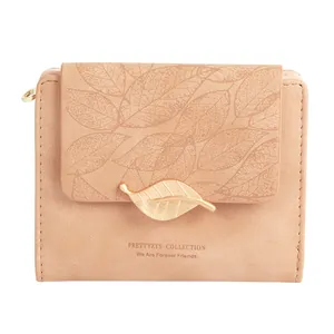 Retro matte beige short wallet for women featuring elegant leaf pattern and gold buckle