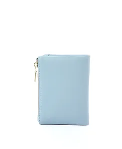 Detailed back view of a compact light blue soft leather bifold wallet for women.