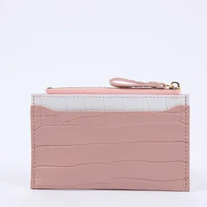 Elegant pink crocodile pattern women's card holder with zipper pocket and white slot