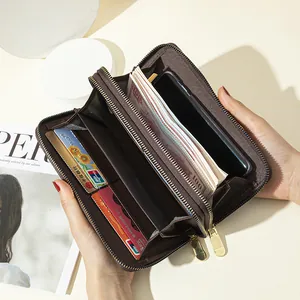 Large capacity double zipper long wallet for women showing interior card slots and phone space.