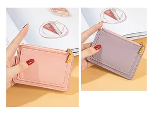 Detailed view of slim multi-slot card holders and coin purses in pink and purple colors