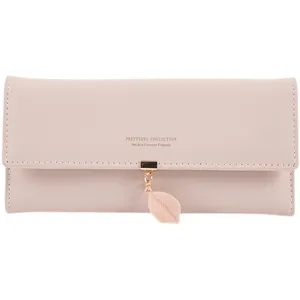 Elegant pink tri-fold long wallet for women with decorative leaf pendant