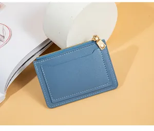Stylish blue synthetic leather card holder featuring gold zipper and multiple slots