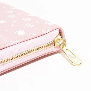 Rosa langes Damen-Portemonnaie mit Hundepfoten-Druck und glattem goldfarbenem Metall-Zipper