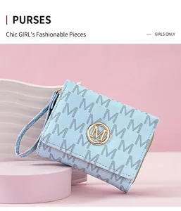 Close-up of a stylish light blue women's tri-fold wallet with elegant M monogram pattern.
