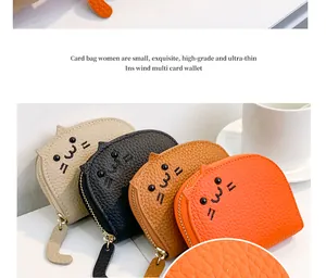 Close-up of cute cat-shaped card bags in various colors with tail zipper pulls
