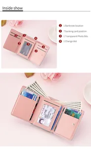 Internal view of a pink tri-fold wallet showing multiple card slots and banknote section.