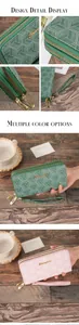 Detail display of geometric print women's long double zipper wallet with wristlet