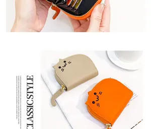 Detailed view of a cute cat-shaped card holder featuring accordion-style card slots