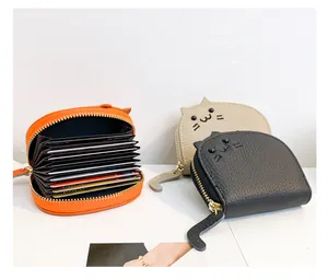 Cute cat-shaped card holder with multiple internal slots and tail-shaped zipper pulls