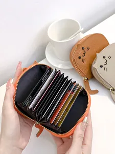 Cute cat-faced orange accordion style card holder with multiple slots for women and girls