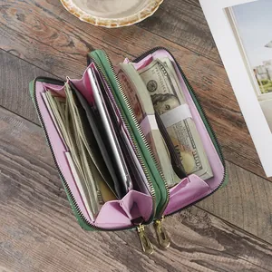 Women's stylish floral print long wallet with double zipper and multi-card slot organizer.