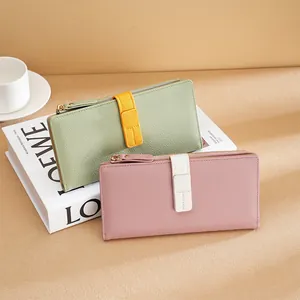Elegant color-block long wallet for women with textured leather and strap closure