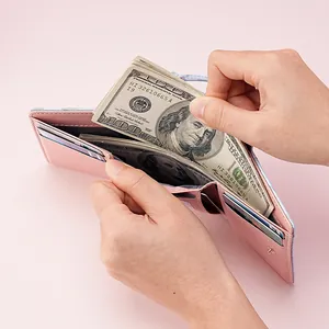 Women's minimalist tri-fold short wallet in pink showing multi-card slots capacity