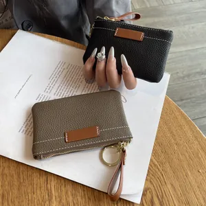 Porte-monnaie minimaliste ultra-fin en cuir avec porte-clés en noir et kaki élégant