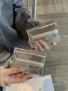 Stylish silver metallic leather card holder with large capacity and minimalist design