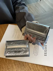 Shiny silver genuine leather card holder for women with multi-slot folding design