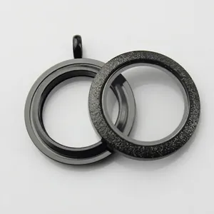 Detailed view of black stainless steel screw-top glass floating locket pendants for jewelry