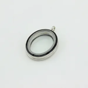 Oval silver floating locket pendant with black enamel ring and clear glass